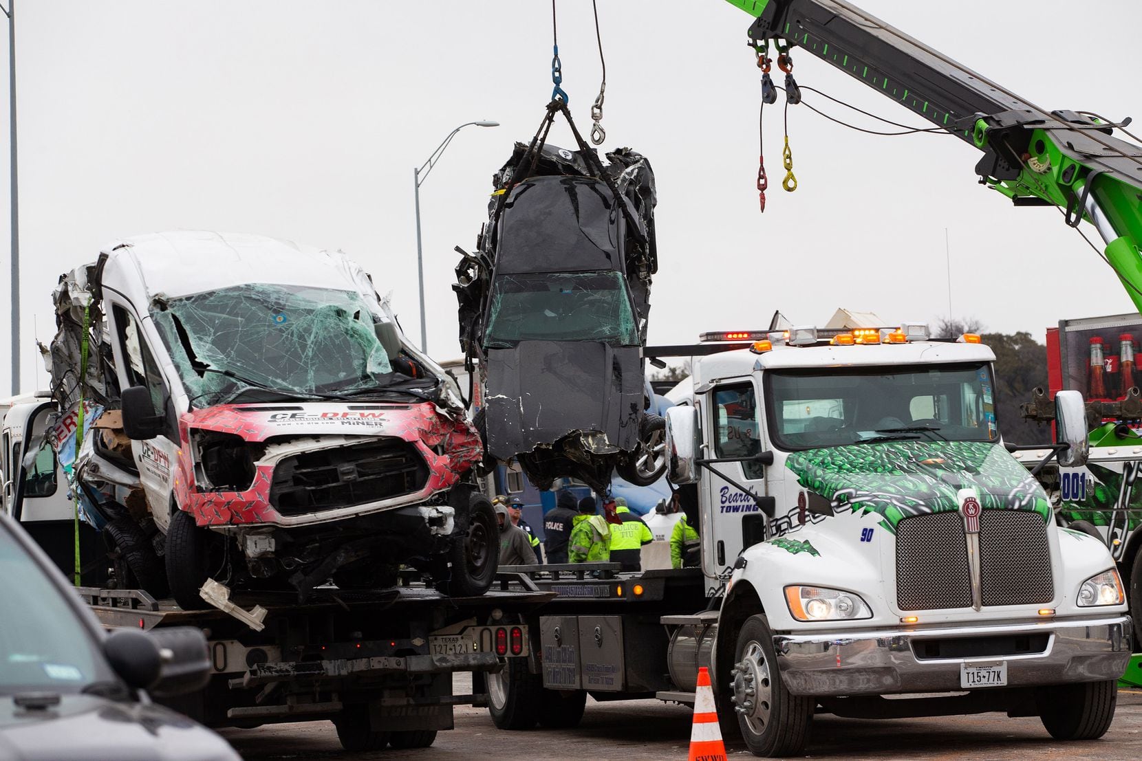 Crews work to clear the mass casualty pile-up on I-35W and Northside Drive in Fort Worth on Feb. 11.