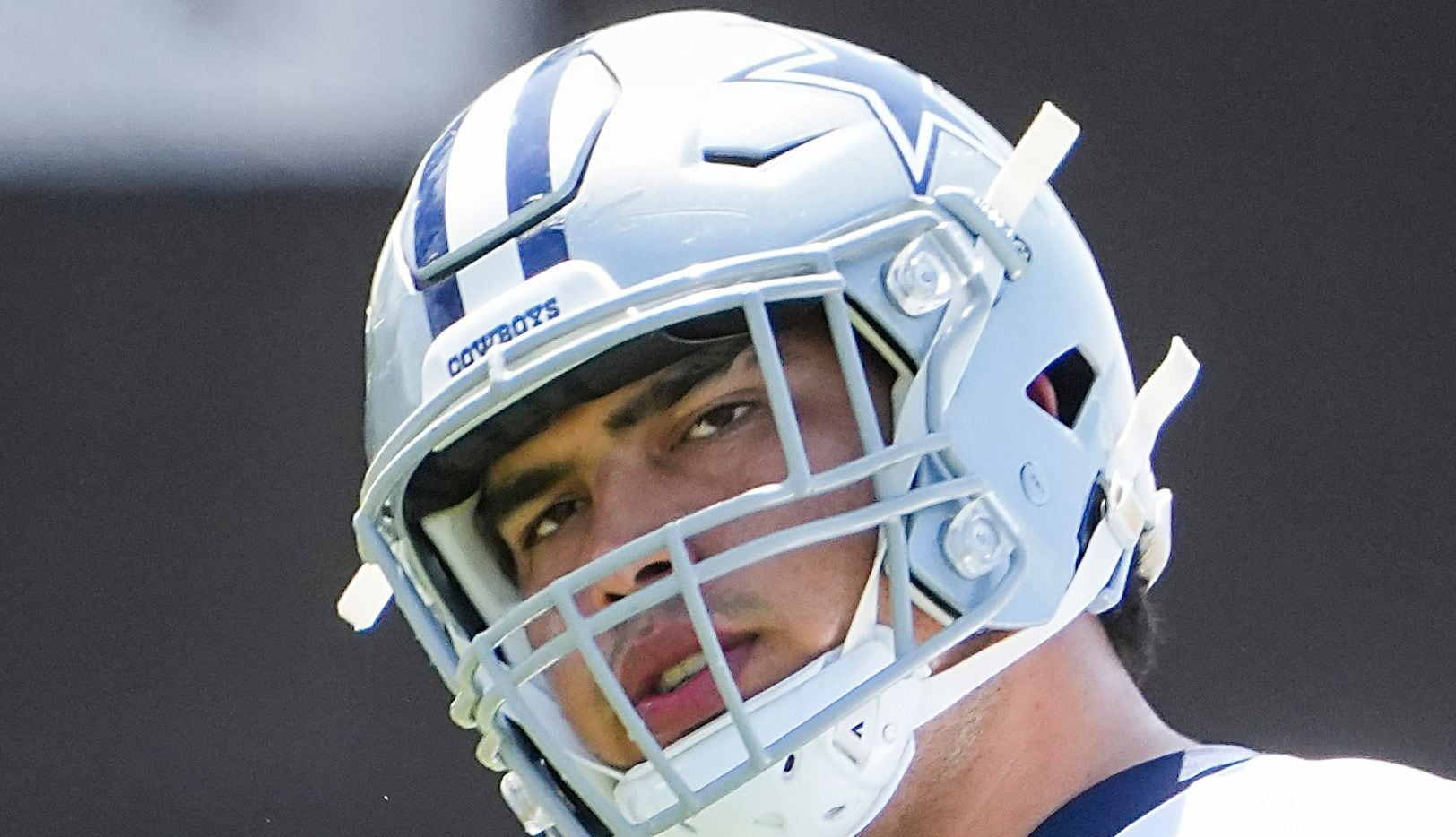 Dallas Cowboys tackle Isaac Alarcón (60) watches during a drill during the first practice of...