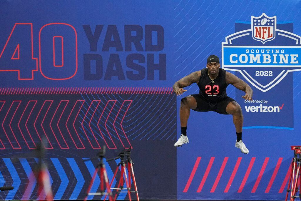 Oklahoma defensive lineman Perrion Winfrey jumps before running the 40-yard dash during the...