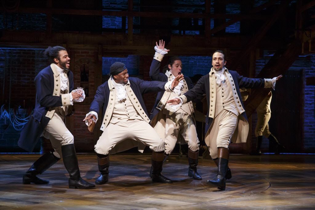 Lin-Manuel Miranda, far right, wrote the musical "Hamilton" and played the title character,...