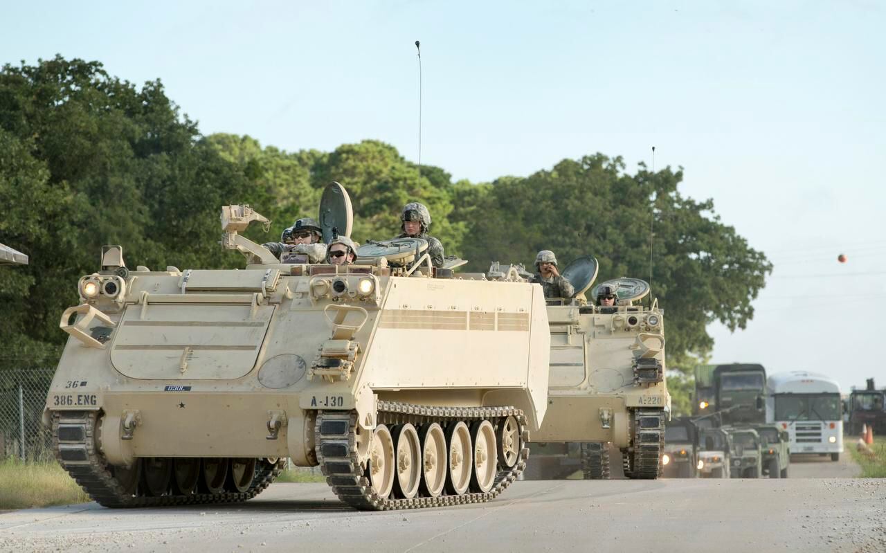 
A convoy of National Guard troops moved toward Camp Swift, seven miles north of Bastrop, on...