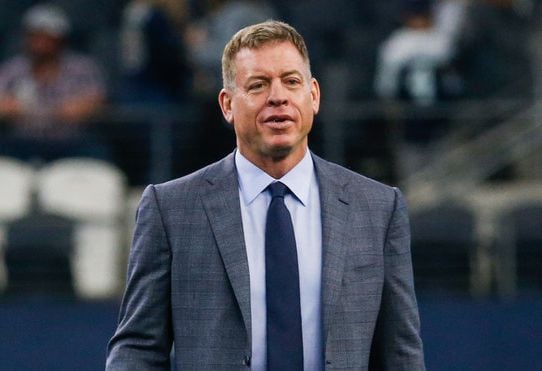 Troy Aikman walks the field prior to an NFL matchup between the Dallas Cowboys and the Los Angeles Rams on Sunday, Dec. 15, 2019 at AT&T Stadium in Arlington, Texas.