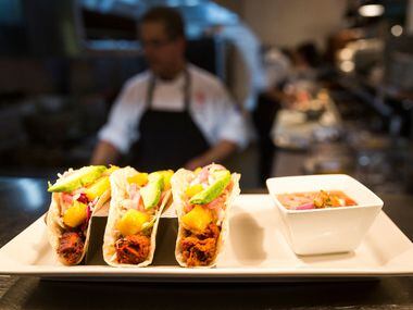 A plate of Al Pastor Tacos waits for delivery to a customer at Beto and Son restaurant in...