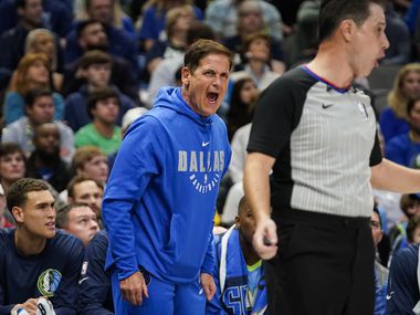 Dallas Mavericks owner Mark Cuban yells at an official during the first half of an NBA basketball game against the Los Angeles Lakers at American Airlines Center on Friday, Jan. 10, 2020, in Dallas.