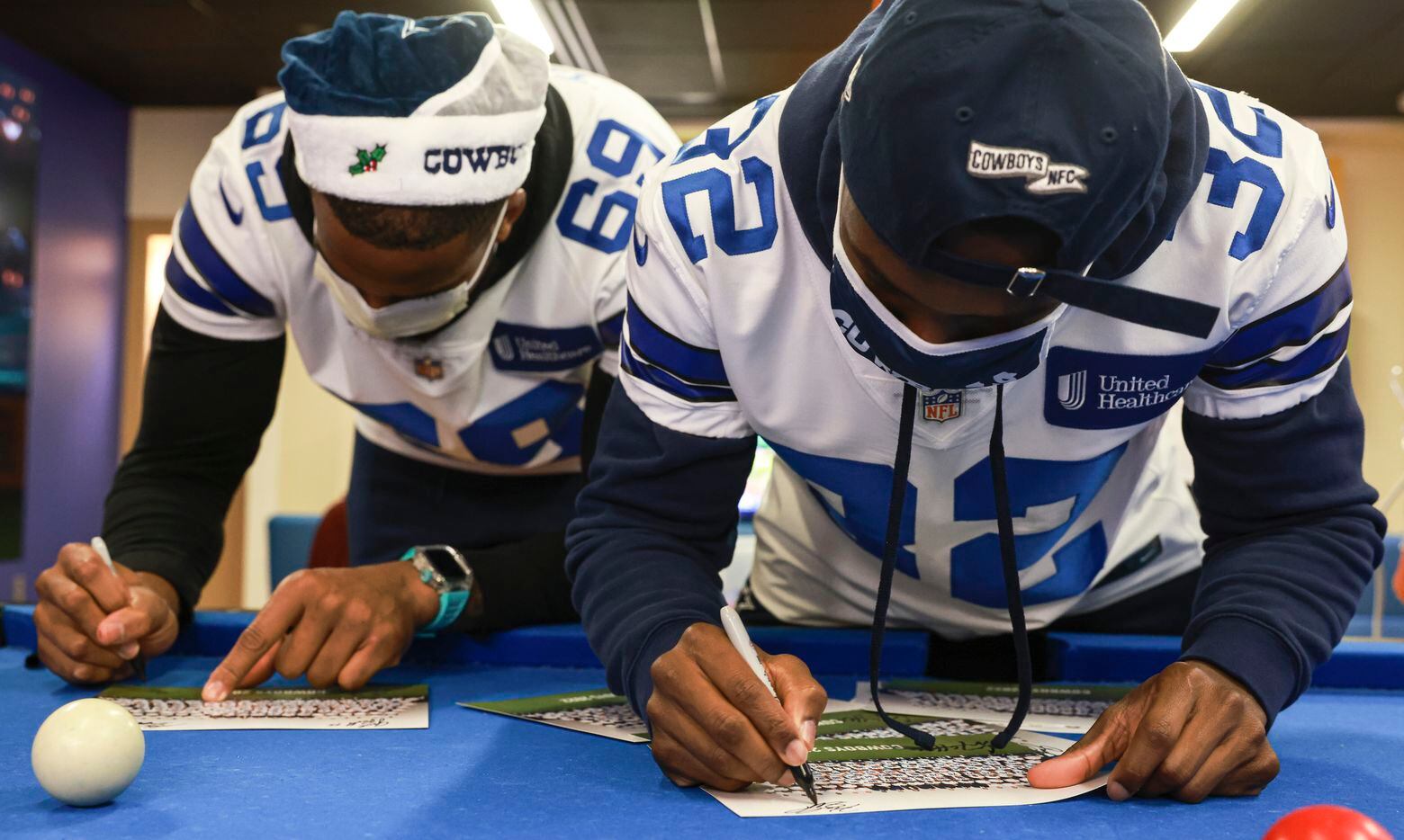 Dallas Cowboys lineman Alex Taylor and cornerback Kendall Sheffield autograph team pictures...