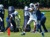 Dallas Cowboys wide receiver Michael Gallup (13) catches a pass during the team's practice...