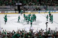Dallas Stars players acknowledge spectators following their 2-1 victory over the Vegas...