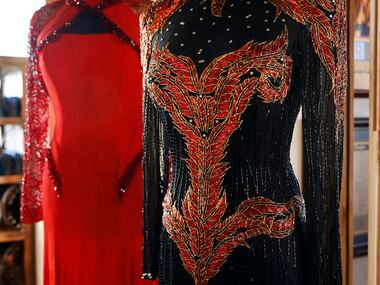 Some of Reba McEntire’s elaborate gowns are on permanent display inside Reba’s Place, a new...