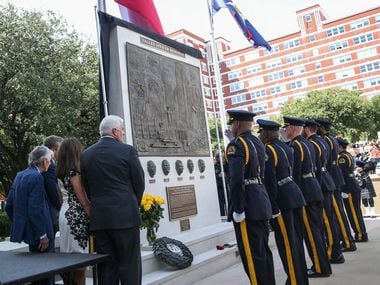 A memorial in honor of the five officers who died on July 7, 2016 is unveiled at the Jack Evans Police Headquarters in Dallas on Monday, July 8, 2019. 