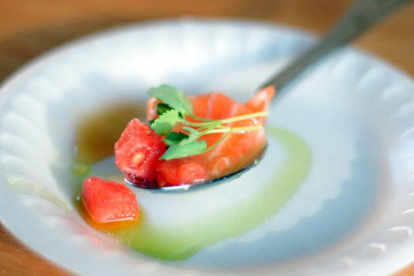 Kenichi serves salmon and seedless Texas watermelon with yuza salsa and micro mint at The...