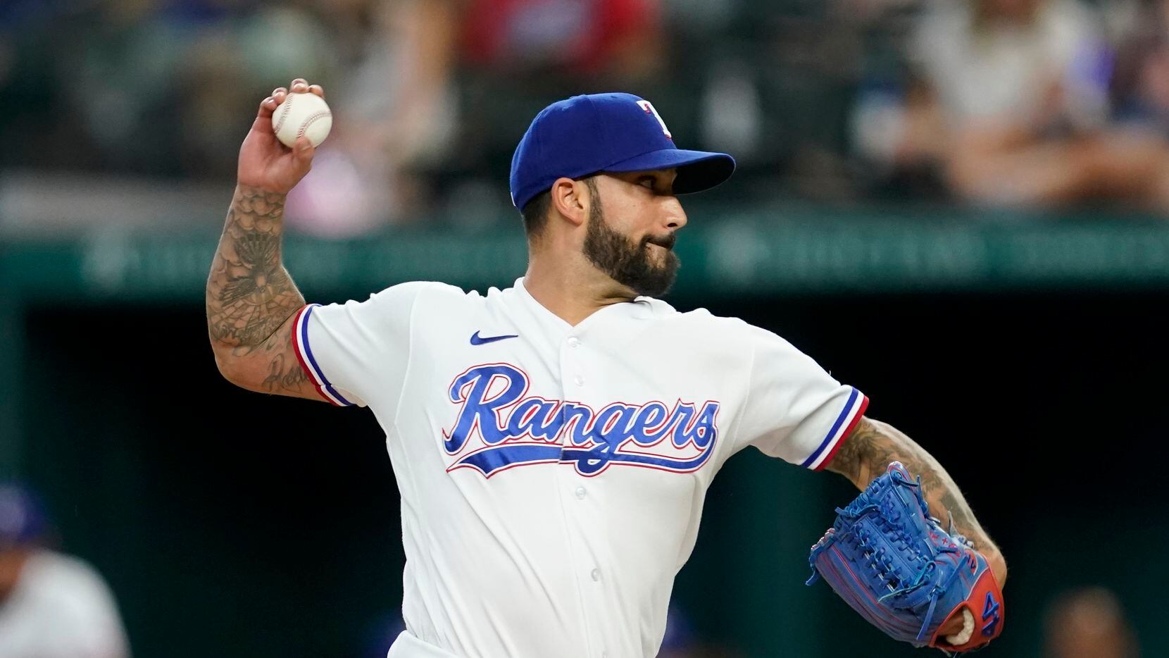 Texas Rangers relief pitcher Matt Bush throws to the Seattle Mariners in the sixth inning of...