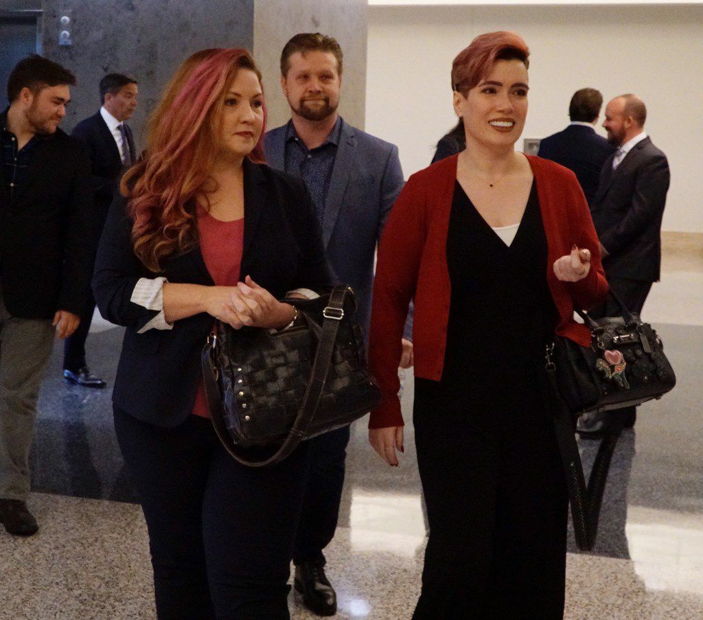 Jamie Marchi (left) and Monica Rial walk into the Tom Vandergriff Civil Courts  Building in...
