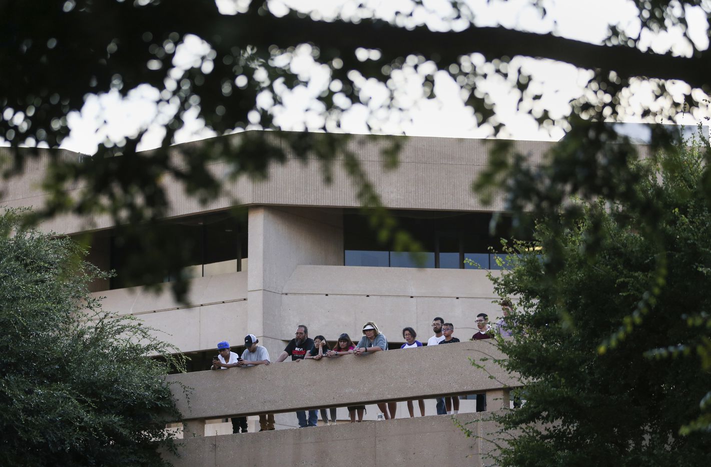 Community members gather for a prayer vigil at the University of Texas Permian Basin on...