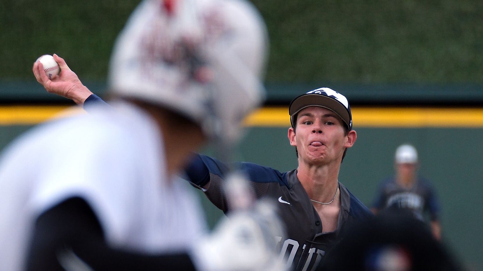Flower Mound Zack James, (7), pitches against Cypress Woods Ethan Farris, (22), during the...