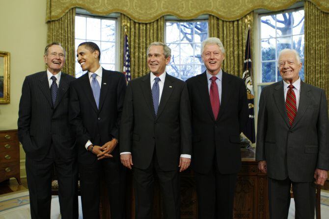 The presidents' club – (from left) George H.W. Bush, Barack Obama, George W. Bush, Bill...