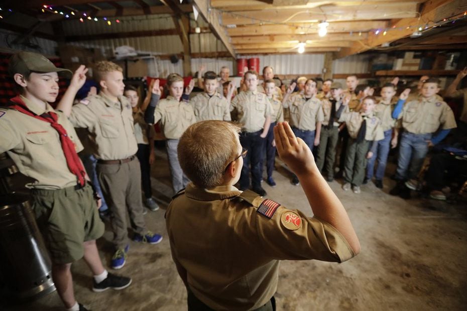 A Boy Scouts troop gathers during a meeting, in Kaysville, Utah. For decades, The Church of...