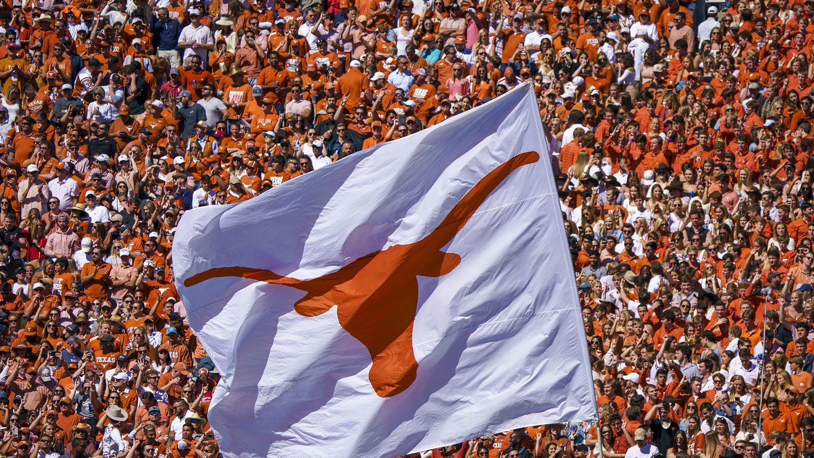 The Texas Longhorns flag is run across the field after a score during the second half of an...