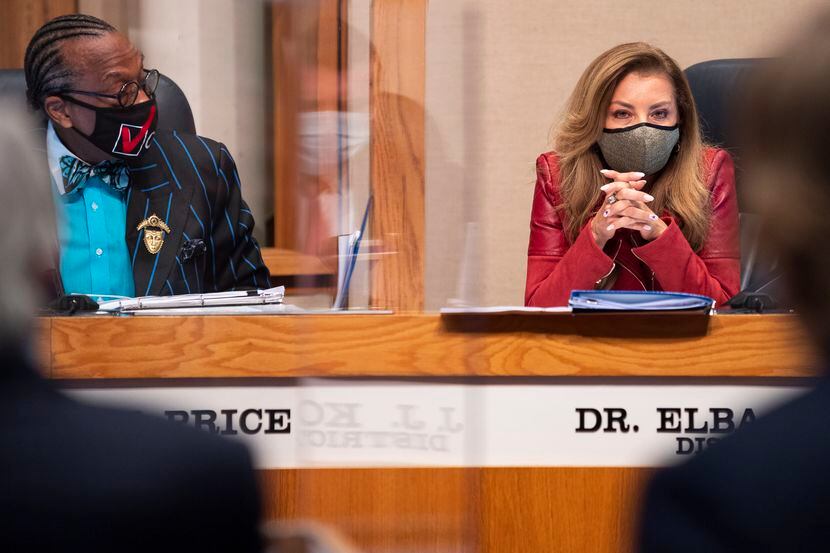 Commissioners John Wiley Price, left, and Elba Garcia, question a legal team as they conduct...