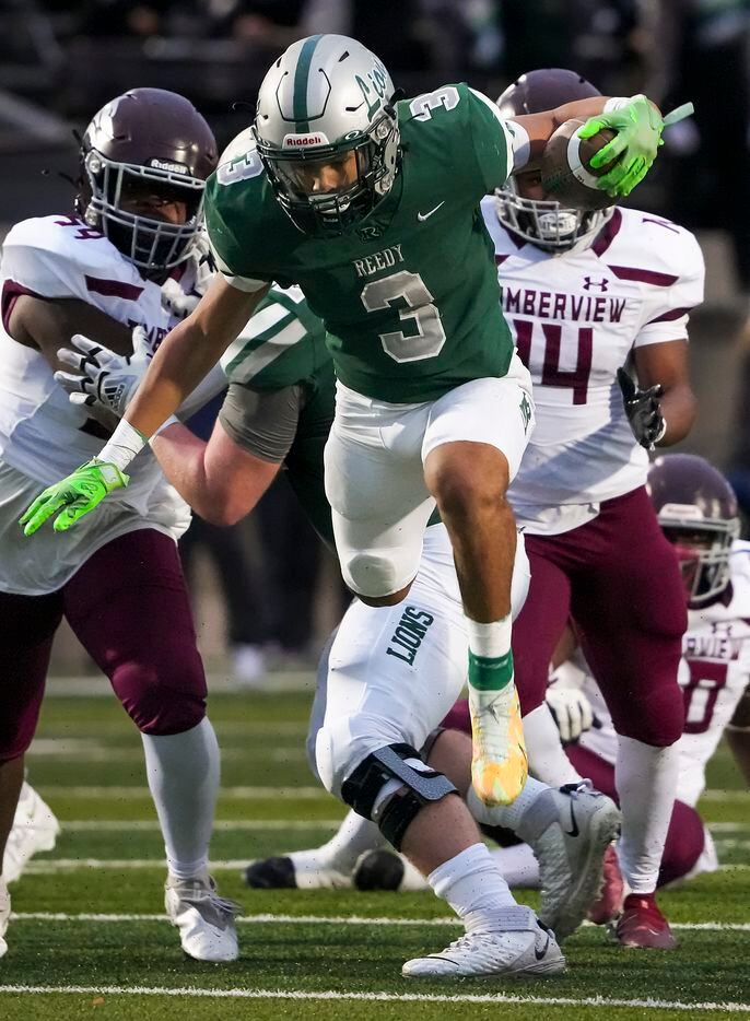 Frisco Reedy running back Dennis Moody (3) gets past Mansfield Timberview defensive linemen...