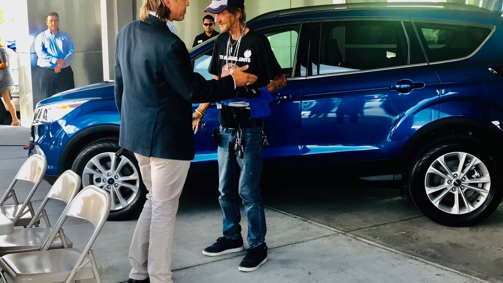 Ronald Wallace Lowenfield of Casa Ford Lincoln Nissan in El Paso presents Antonio Basco with...