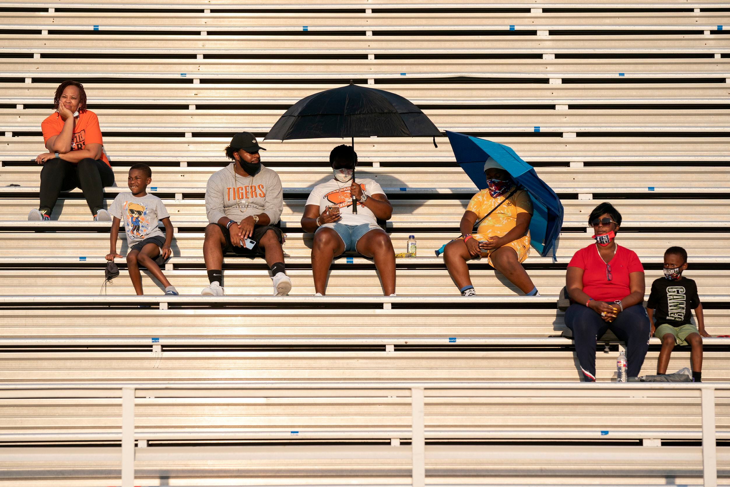 Lancaster fans sit in the stands before a high school football game against Skyline on...
