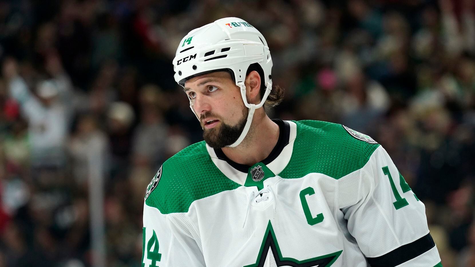 Dallas Stars left wing Jamie Benn pauses during the third period of the team's NHL preseason...