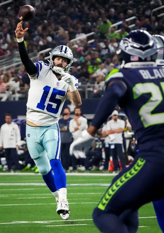 Dallas Cowboys quarterback Will Grier (15) throws a touchdown pass during the second quarter...