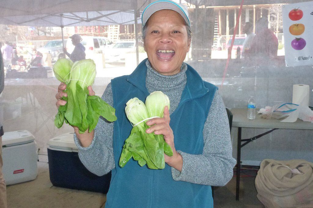 Thongma Williams grows four kinds of bok choy at her family's Jacksonville farm and sells at...