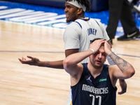Dallas Mavericks guard Luka Doncic (77) reacts after being fouled by Golden State Warriors...
