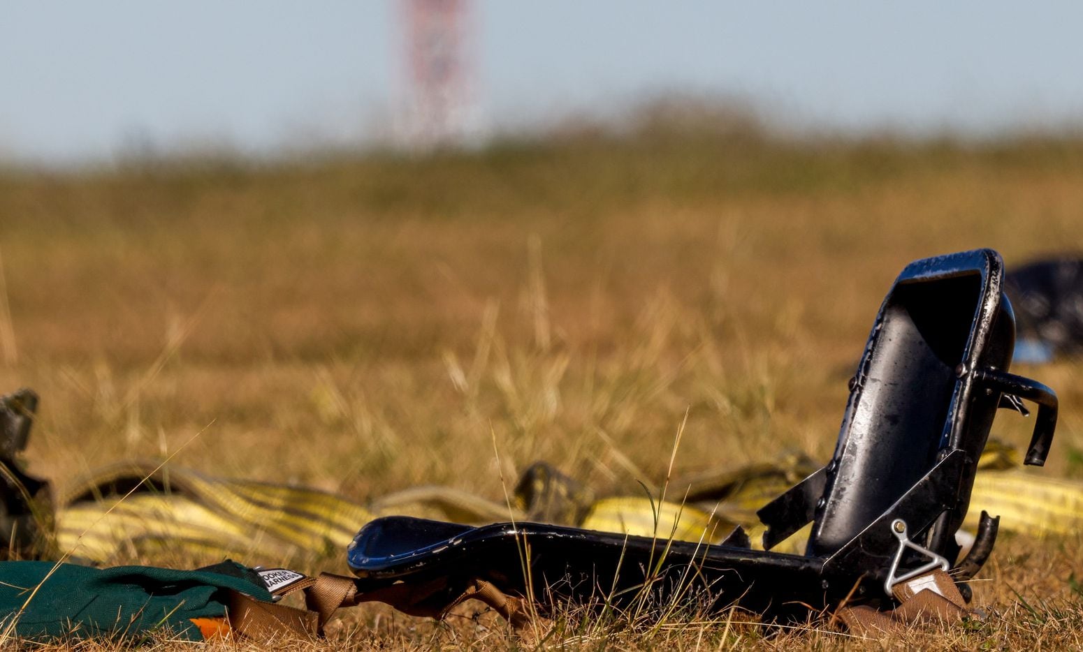 Debris lays across the open field at the Dallas Executive Airport on Sunday, Nov. 13, 2022,...