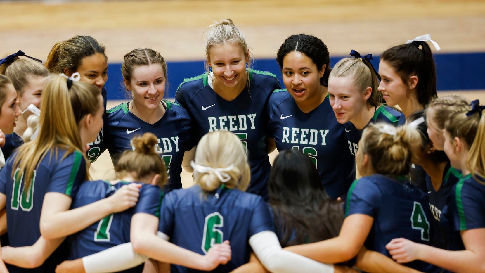 Frisco Reedy Lions huddle before the start of a Class 5A Region II final volleyball game...
