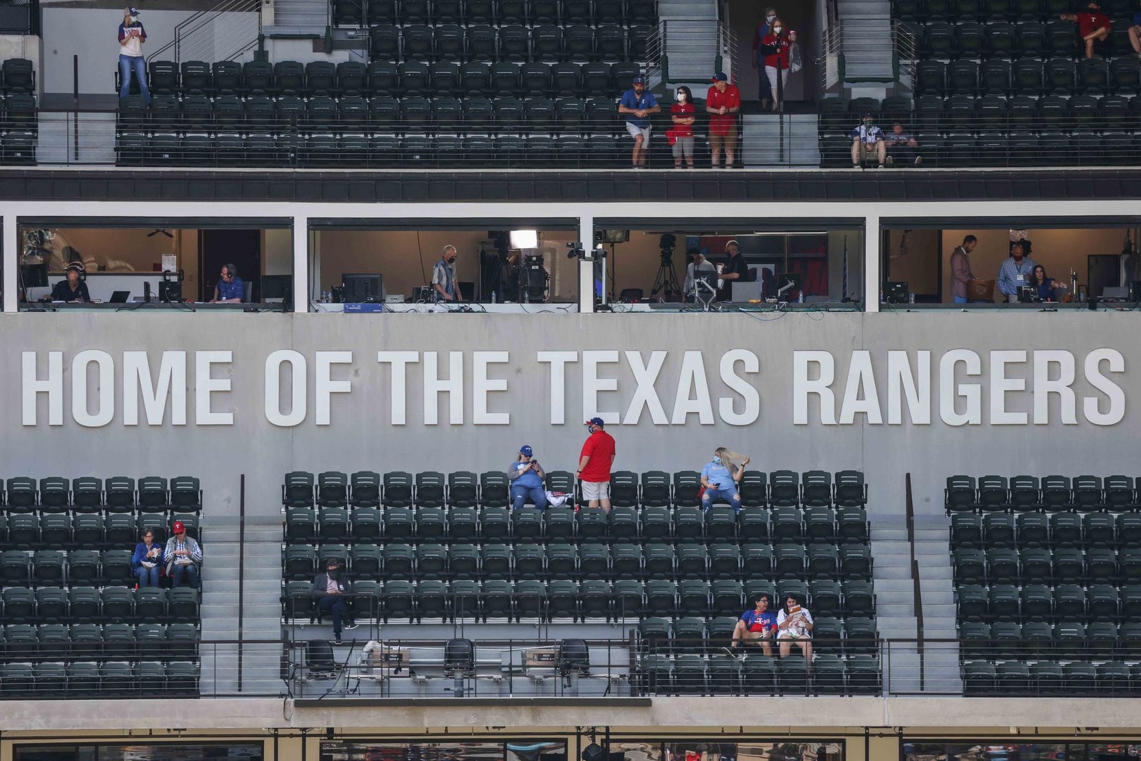 Fans start to arrive to the the Globe Life Field to attend the game between Texas Rangers and Toronto Blue Jays on opening day in Arlington, Texas on Monday, April 5, 2021. (Lola Gomez/The Dallas Morning News)