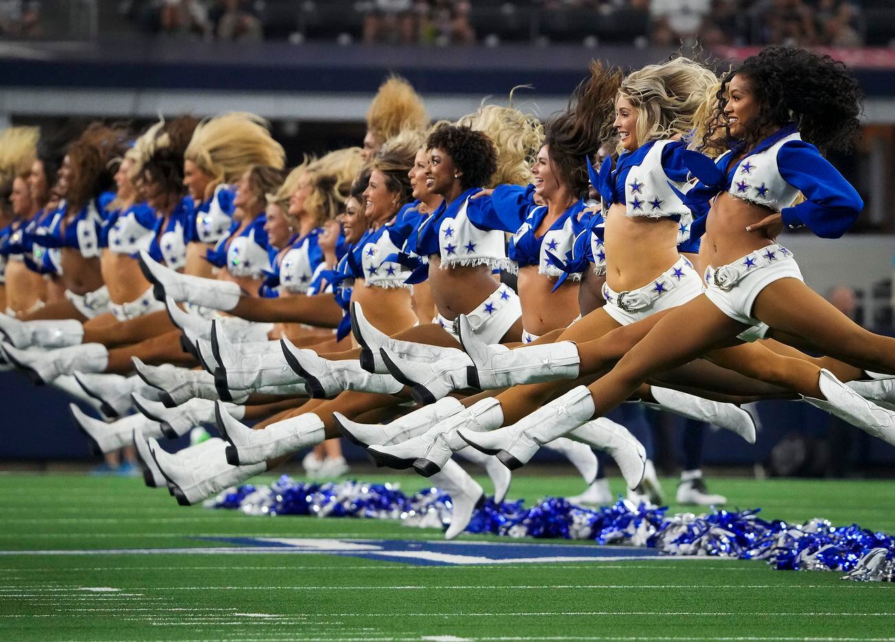 The Dallas Cowboys Cheerleaders perform before an NFL preseason football game against the...