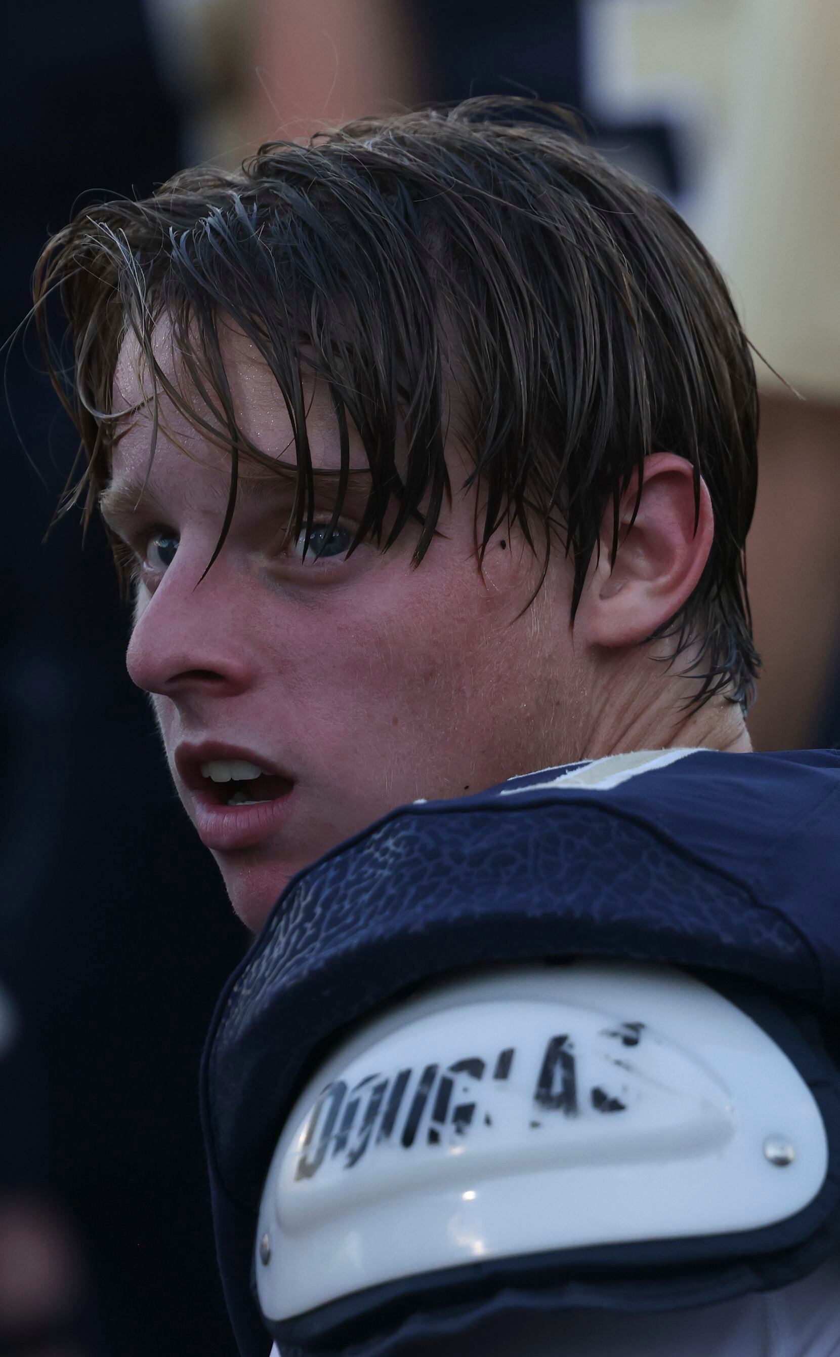 Jesuit Dallas Charlie Schmidt (17) sits on the bench during the football game between Jesuit...