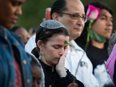 Rabbi Elana Zelony bows her head during the "Remember His Name: Vigil for Jordan Edwards"...