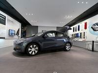 FILE - A Tesla Model Y Long Range is displayed on Feb. 24, 2021, at the Tesla Gallery in...