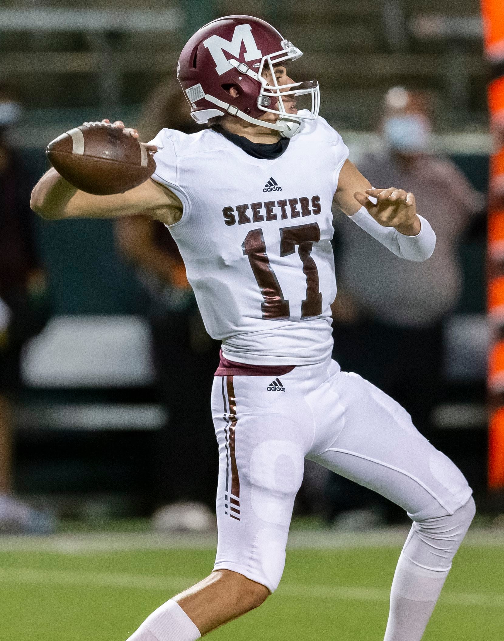 Mesquite senior quarterback Hunter Nucci (19) throws during the first half of a high school...