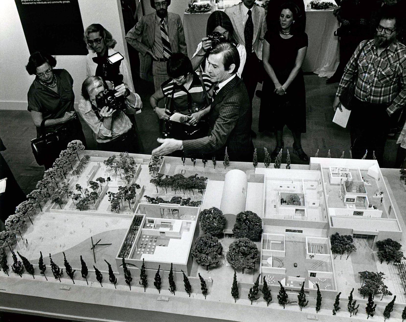 PUBLISHED September 14, 1979 - Architect Edward Larrabee Barnes (center) displays a model of the new Dallas Museum of Art.