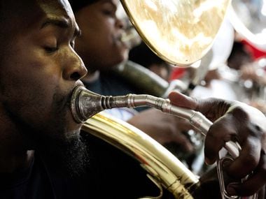 Markel Hall plays the tuba.  Hall is the band director at South Oak Cliff High School and...