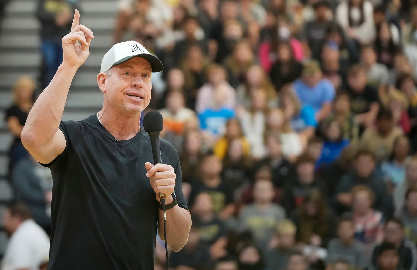 Aikman talks to the students during a pep rally at Henryetta High School.