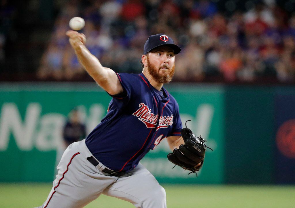 FILE - In this  Friday, Aug. 16, 2019 file photo, Minnesota Twins relief pitcher Sam Dyson...