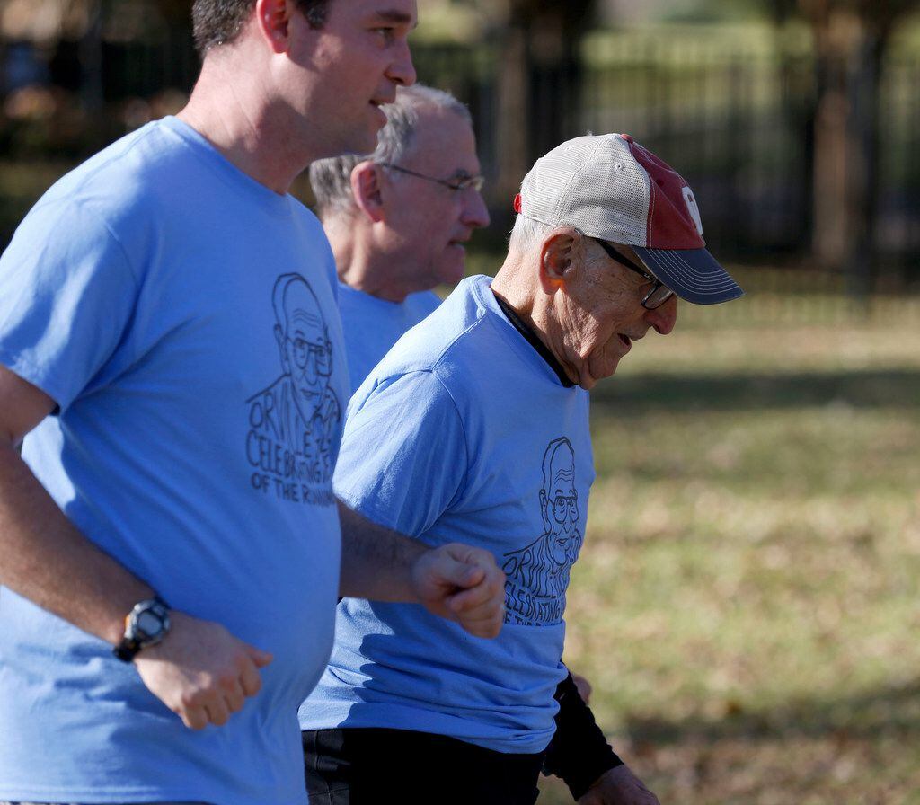 Orville Rogers, who is turning 100-years-old, runs with his family including his...
