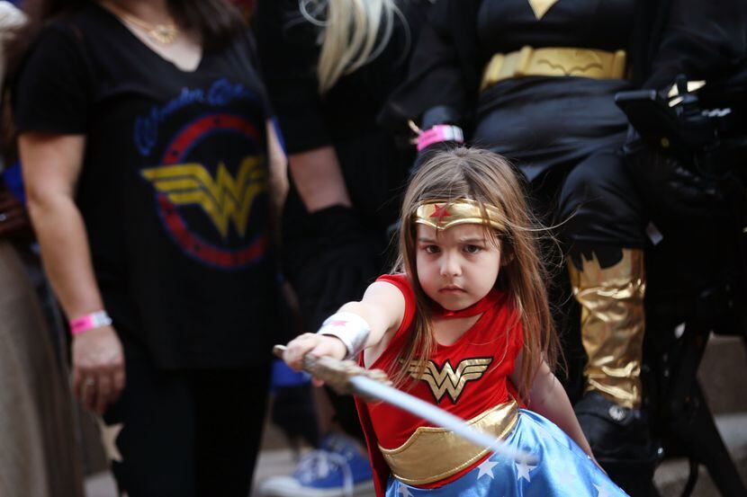 Raquel Compton attends the Women of Wonder Con dressed as a superhero.