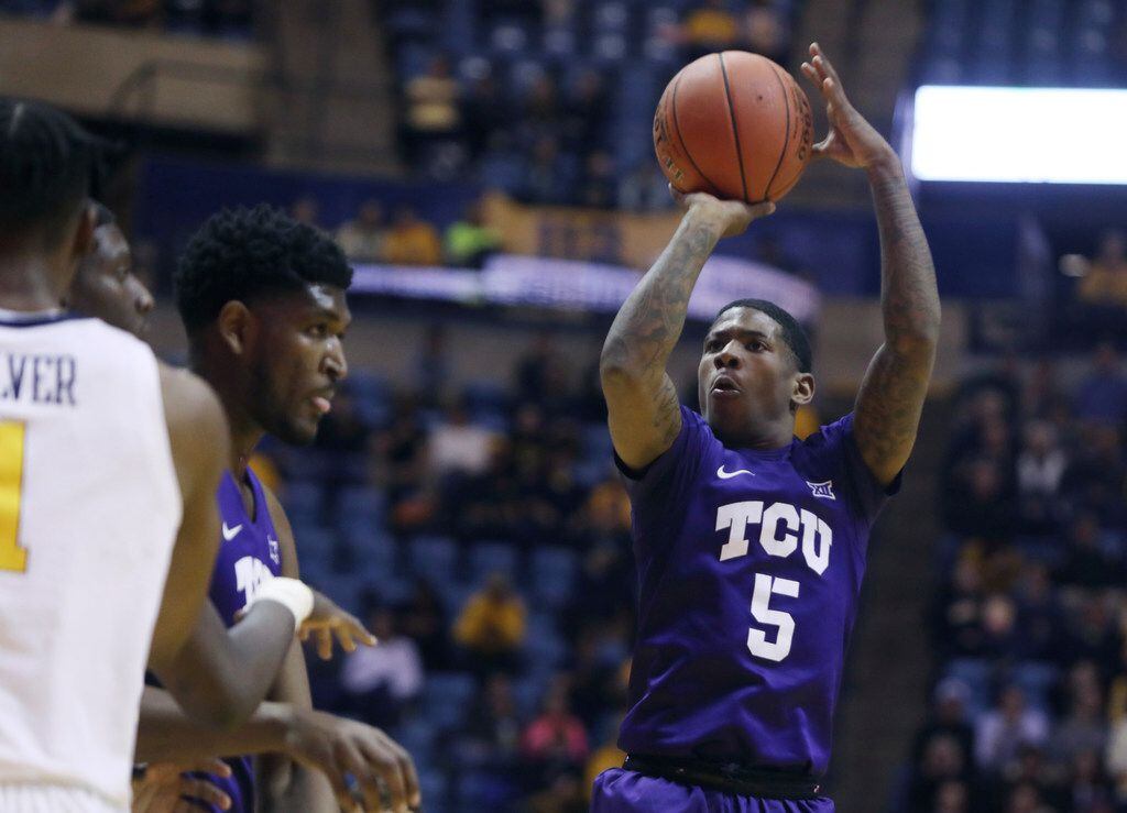 TCU guard Kendric Davis (5) shoots against the West Virginia defense during the first half...