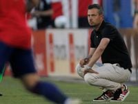 FC Dallas head coach Nico Estevez watches first half action against Vancouver from the team...