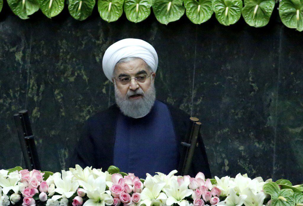 Iran's President Hassan Rouhani delivers a speech after being sworn in before parliament in...