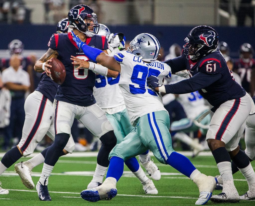 Dallas Cowboys defensive end Christian Covington (95) sacks Houston Texans quarterback...