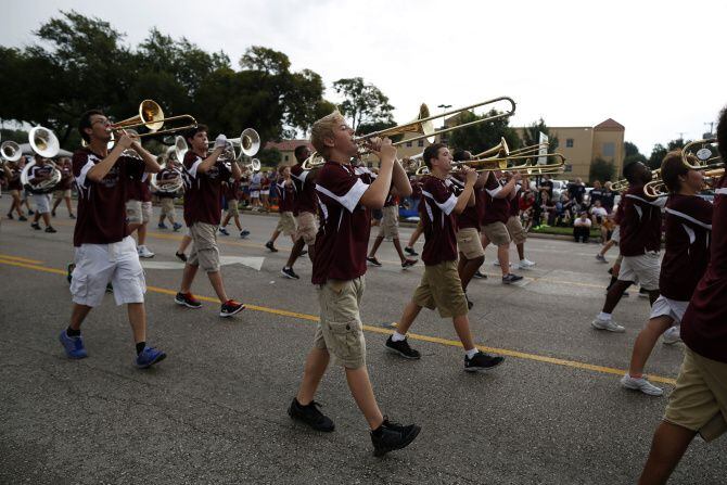 A marching band performs during the Garland Labor Day Parade.