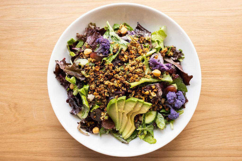 Falaf salad of mixt greens, house-baked falafel crumbles, roasted cauliflower, avocado, red flame grapes, cucumbers, chickpeas, fresh herbs,  and lemon tahini vinaigrette at Mixt  in Uptown on Tuesday, May 7, 2019, in Dallas. (Smiley N. Pool/The Dallas Morning News)