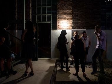Patrons congregated outside The Power Station art gallery during a one-night Culture Hole...